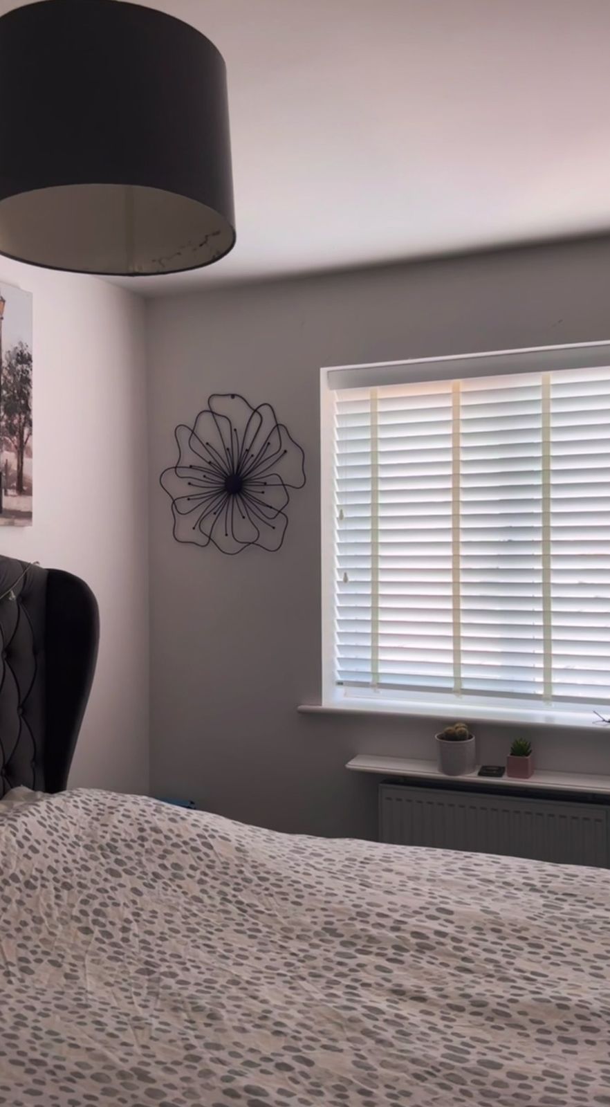 Bedroom with clean white blinds